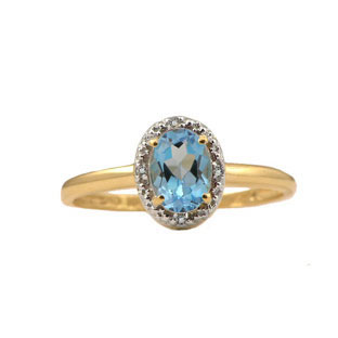 Diamond and Oval Blue Topaz Yellow Gold Ring